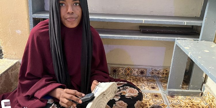 Maryan, 14, goes to work every day shining shoes to support her sick mother in hospital, as well as her siblings and grandmother. Her father died some years ago and they returned to Mogadishu from Yemen where they we reliving as refugees. She earns two or three dollars a day when lucky to get shoes to shine.